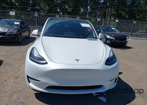 2023 Tesla Model Y Awd/Long Range Dual Motor All-Wheel Drive z USA, uszkodzony, nr VIN 7SAYGAEE1PF700262